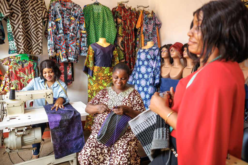 Women working in a garment store.