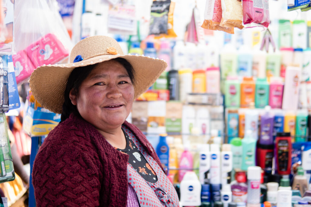 BancoSol client Macaria sells at a market stall in El Alto, Bolivia