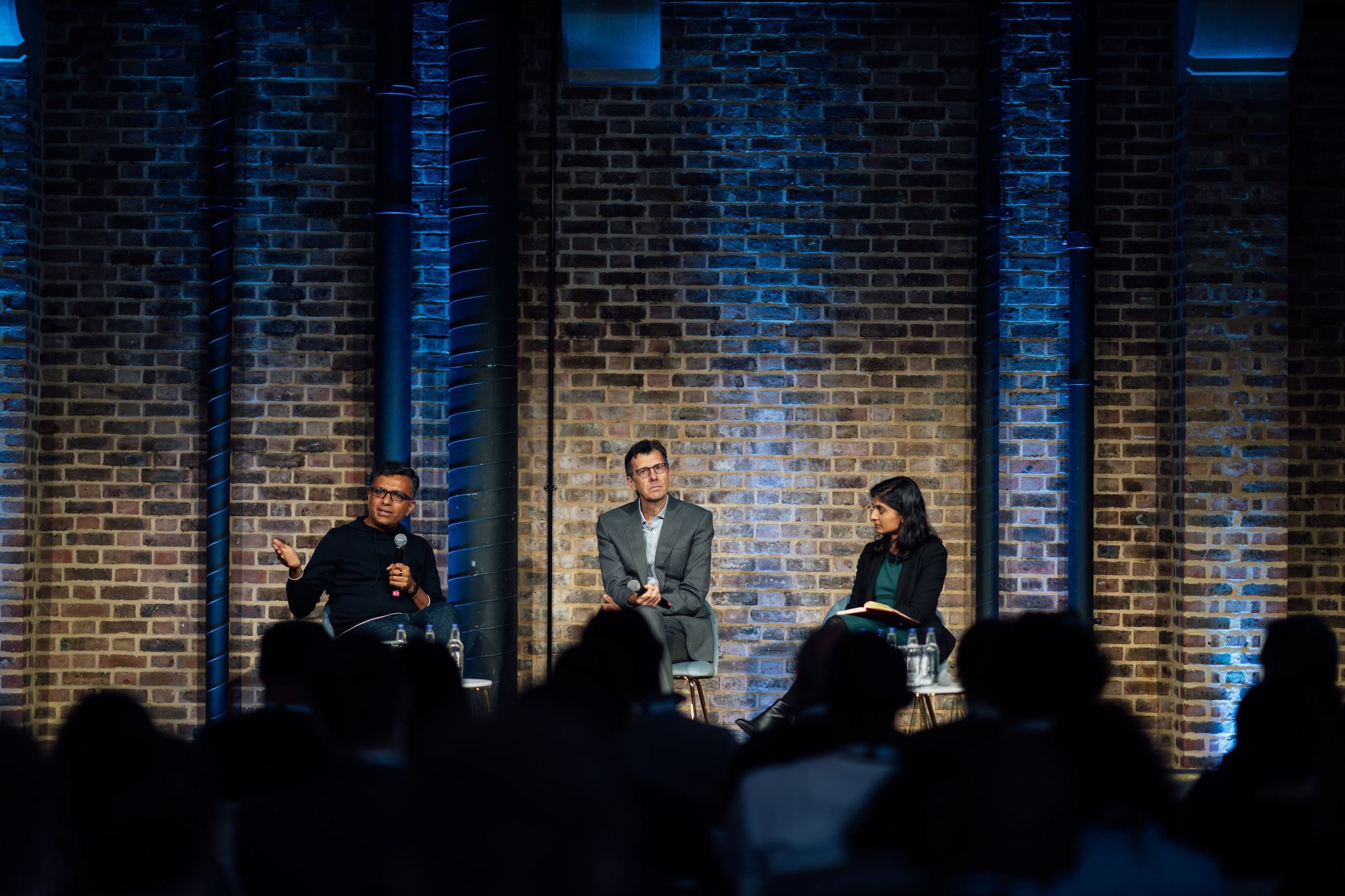 Jorn Lambert, TS Anil, and Amee Parbhoo speak during the Summit