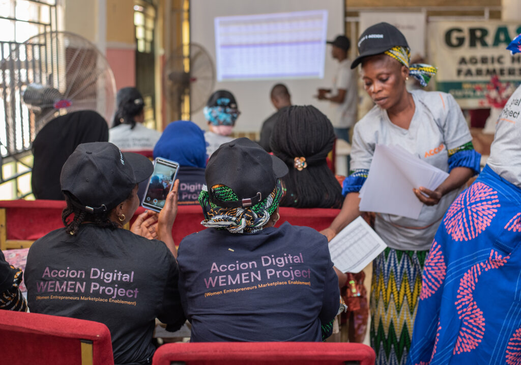 A group of women participants of the WEMEN project are sitting in the room