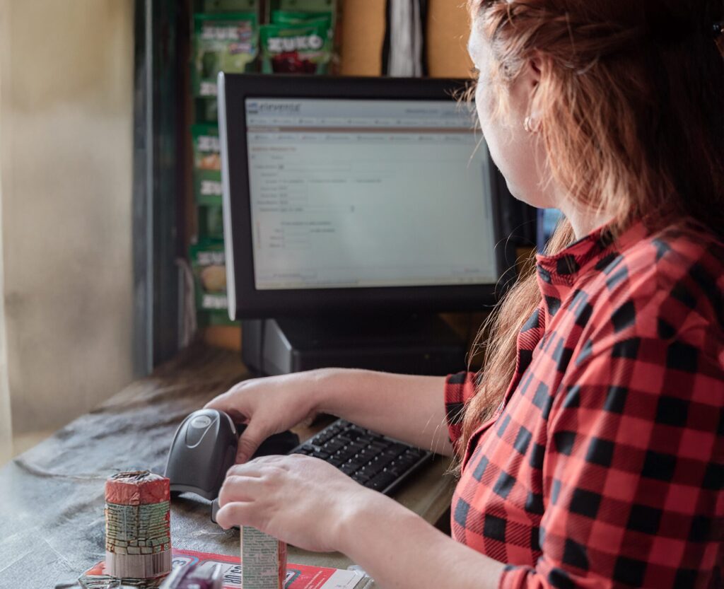 woman working at her convenience store in Mexico